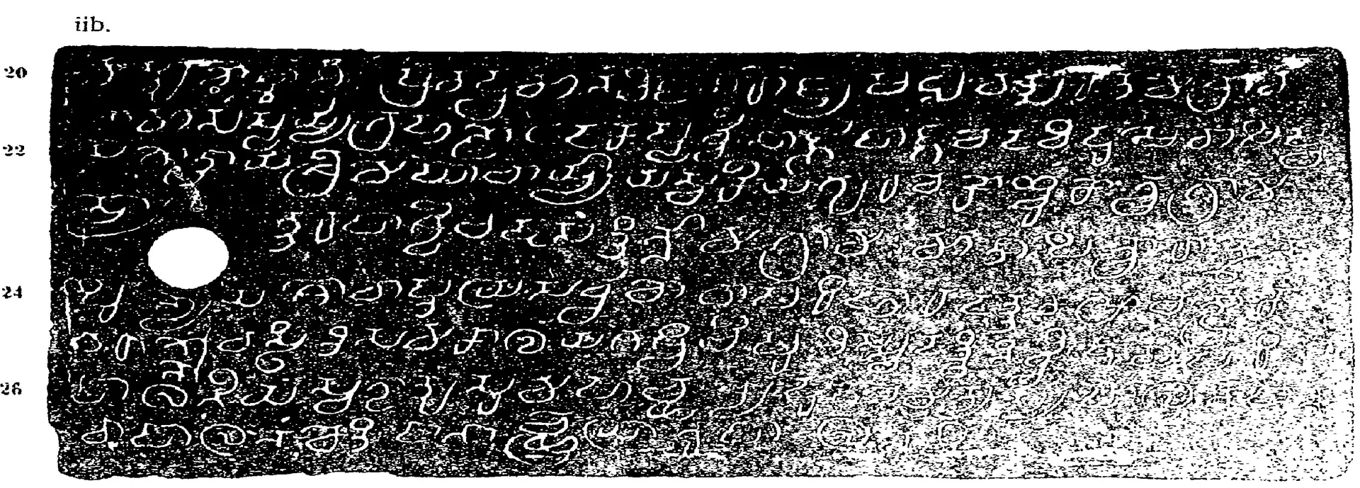 Ink impression of a long inscribed copper plate (ii b), white Telugu-Kannada letters on black, with a round ring hole at the left and line numbers along the edge.