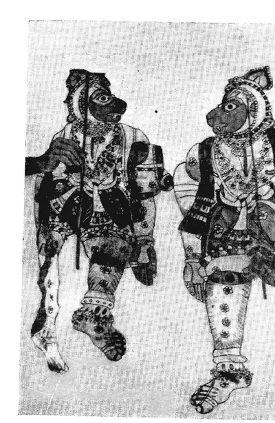 Black-and-white photograph of two leather puppets of monkey-faced warriors in patterned clothes, standing side by side.