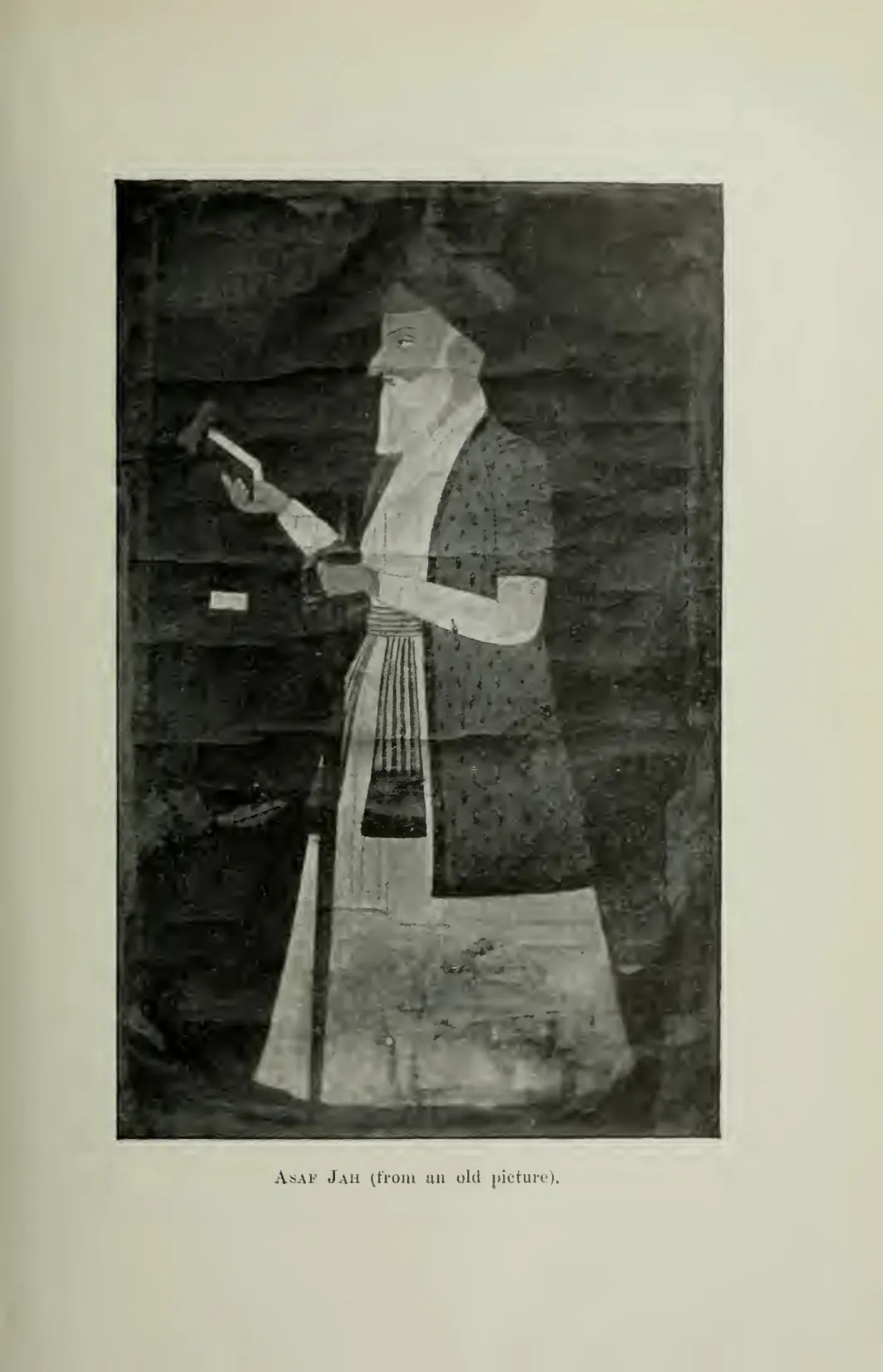 Reproduction of an old painted portrait of Asaf Jah, an elderly bearded man in a long robe and turban, standing.