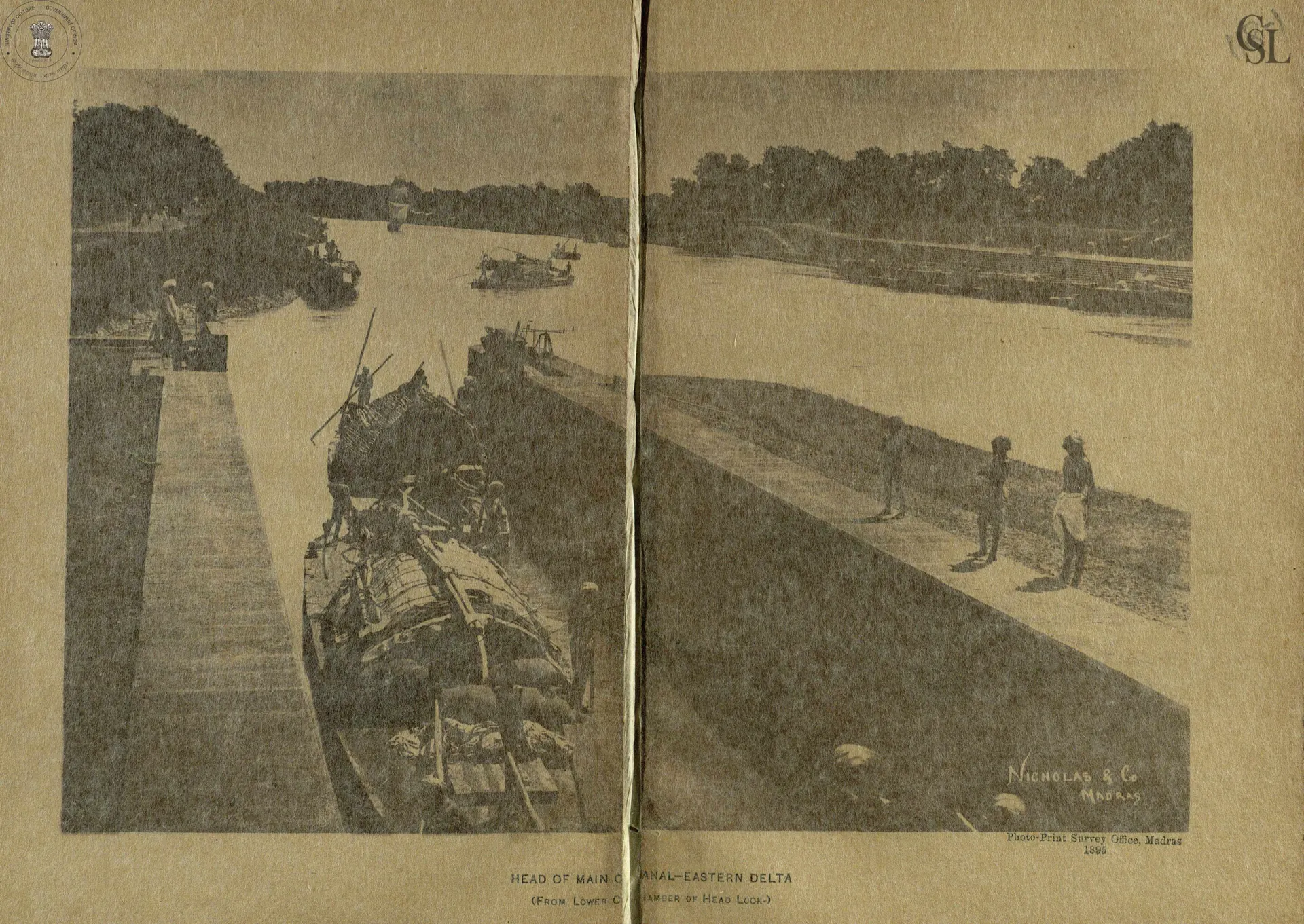 Two-page photograph of the head of the Eastern Delta main canal with country boats in the lock and people standing on the bank.