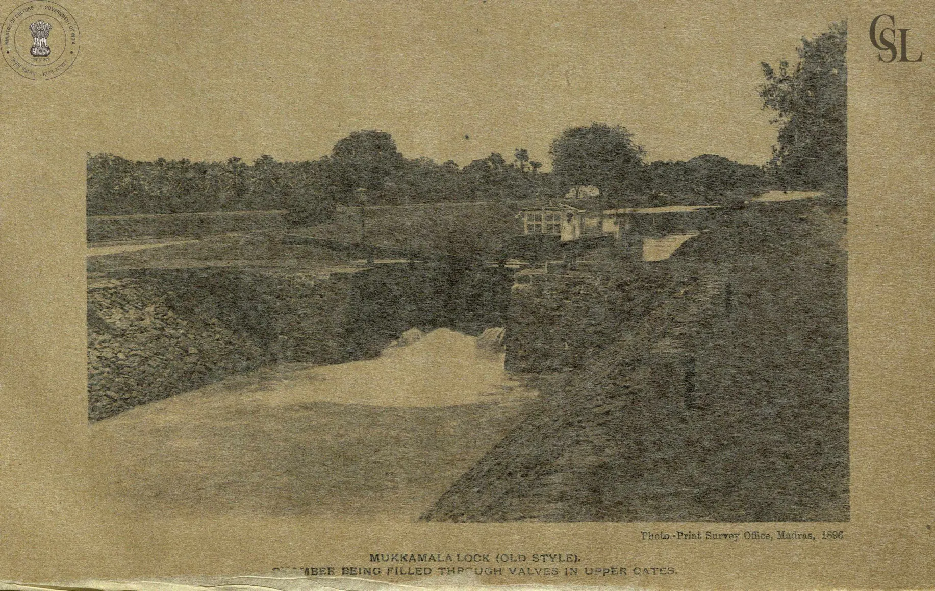 Photograph of a canal lock at Mukkamala with water pouring into the lock chamber through the upper gates.