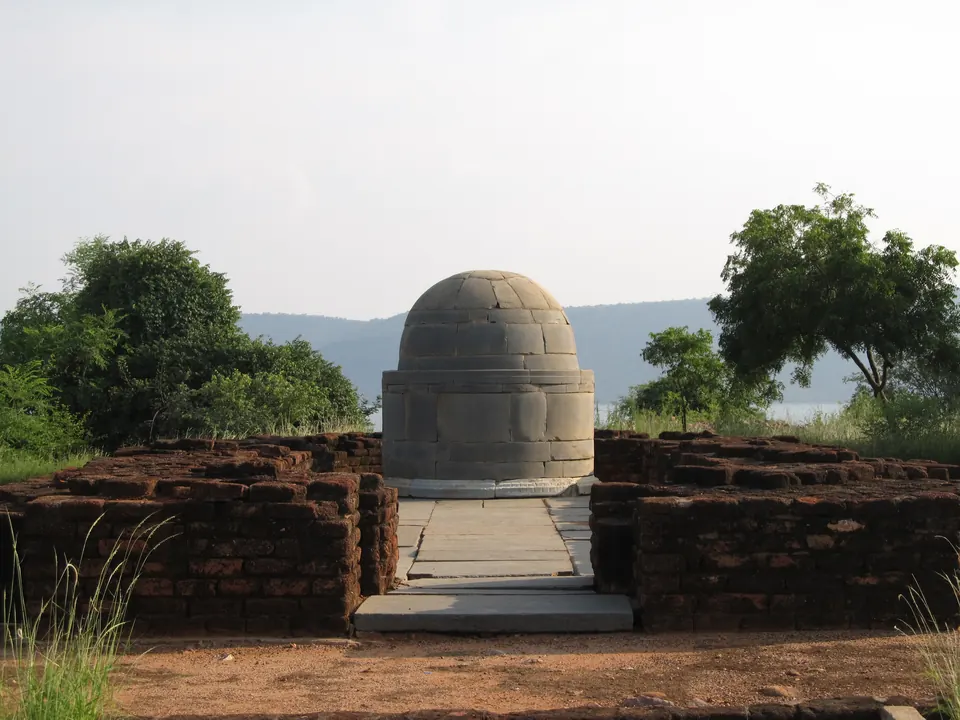 The rebuilt Bodhisri chaitya at Nagarjunakonda, a small domed stupa inside a brick apsidal shrine.