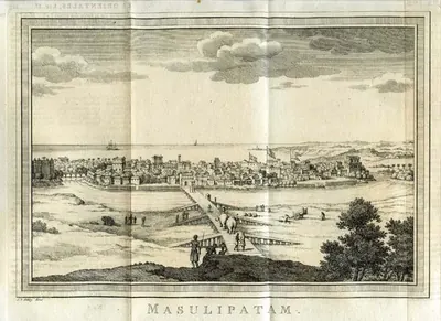 Engraved panorama of a flat walled town by the sea, with flags flying over the buildings and ships offshore, seen across open ground and a long causeway on which bullock carts and people travel, with a man and trees in the foreground.