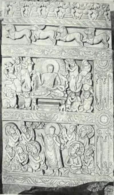 A carved limestone slab in registers: a frieze of running animals above, a seated Buddha among worshippers in the middle and a standing Buddha among figures below.