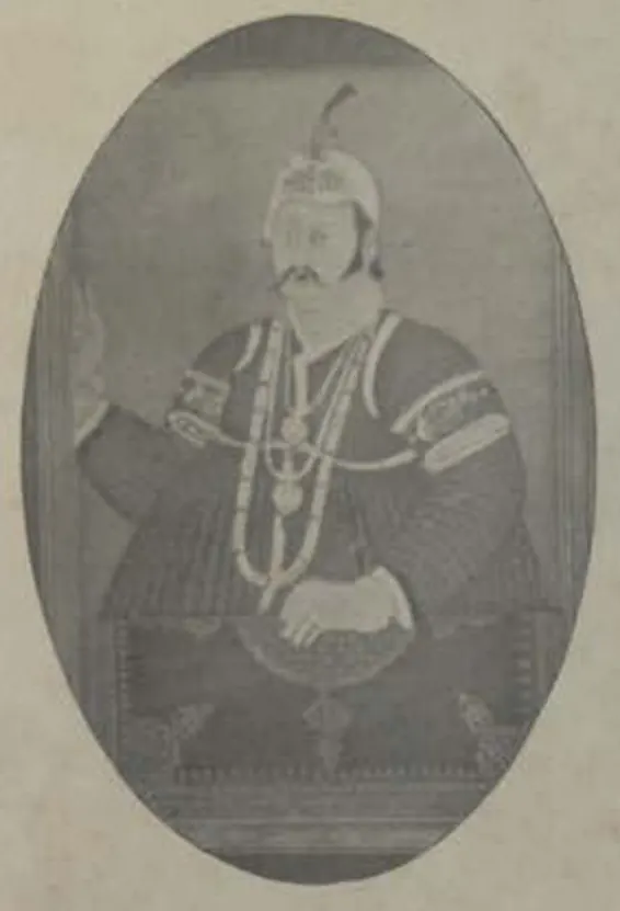 Oval photograph of a painted half-length portrait of an earlier Nizam in a jewelled turban and necklaces.