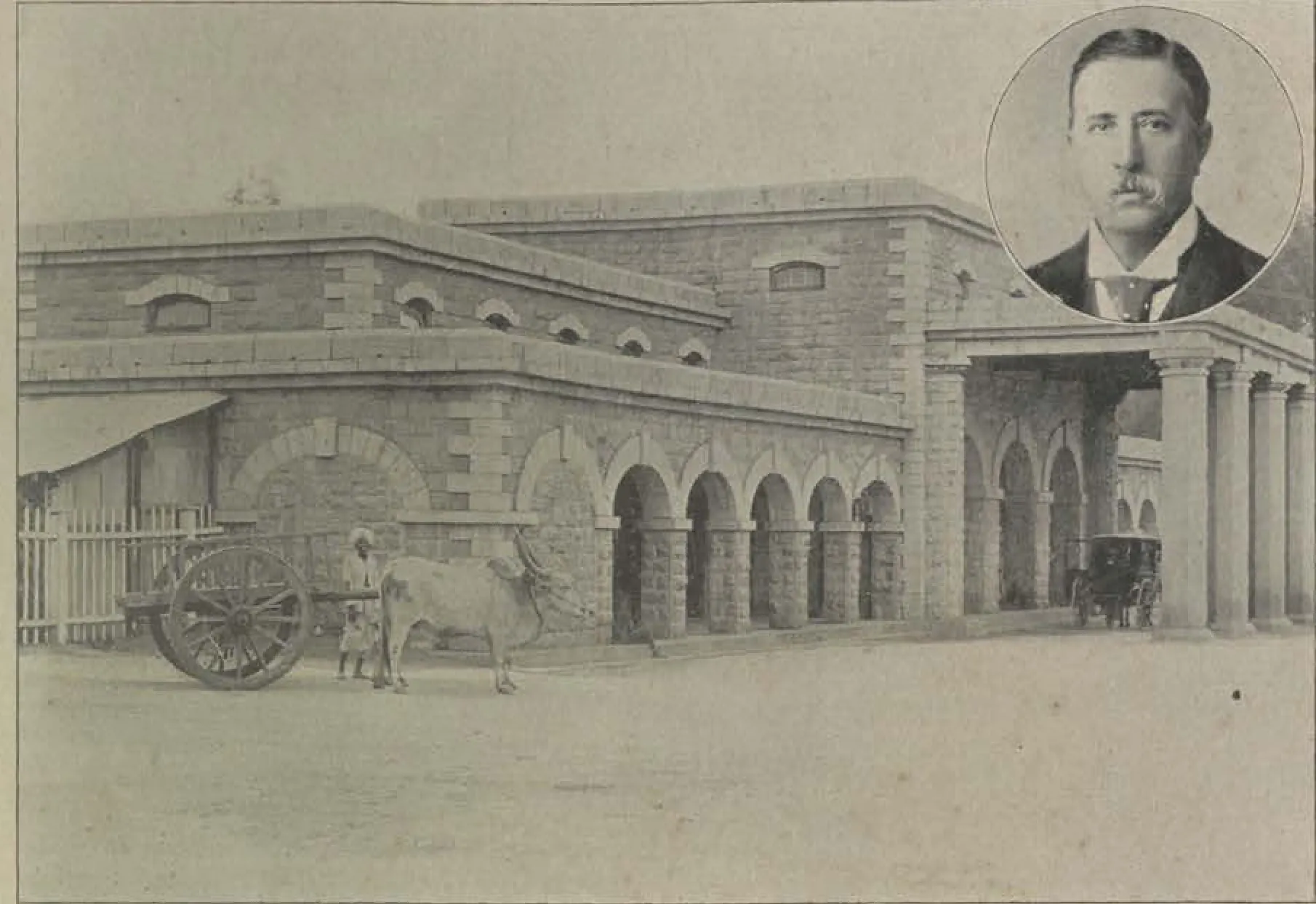 The Secunderabad railway station, an arcaded stone building with a bullock cart in front; an inset portrait of a man at top right.