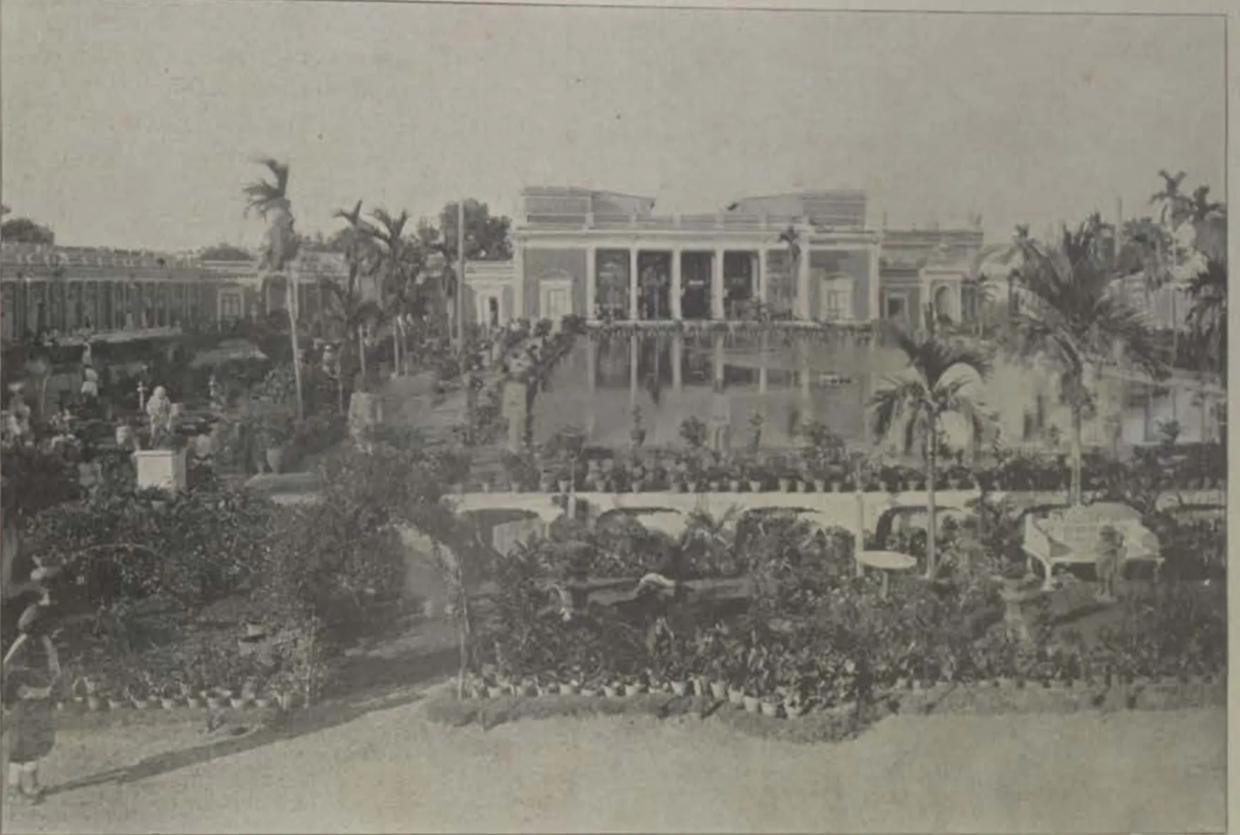 The Chowmahalla palace seen across a garden.