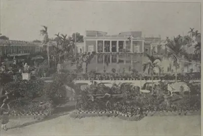 The Chowmahalla palace seen across a garden.