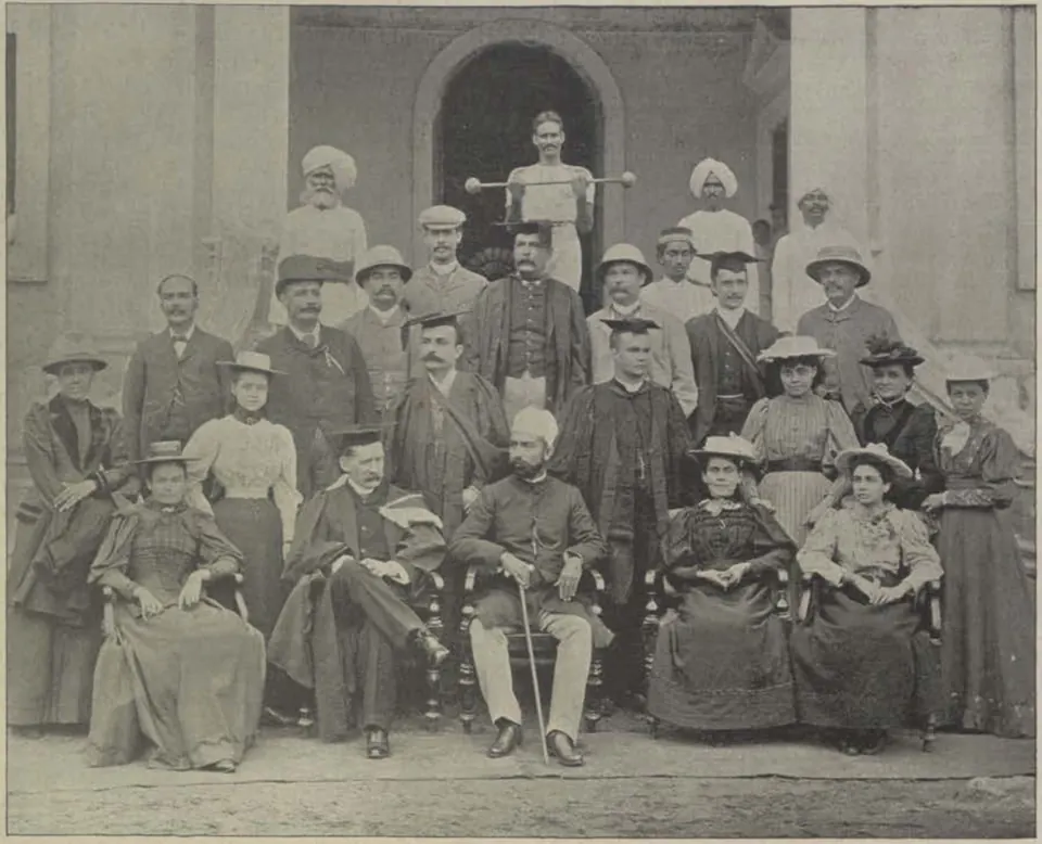 The committee and staff of St. George's Grammar School, seated and standing in two rows.