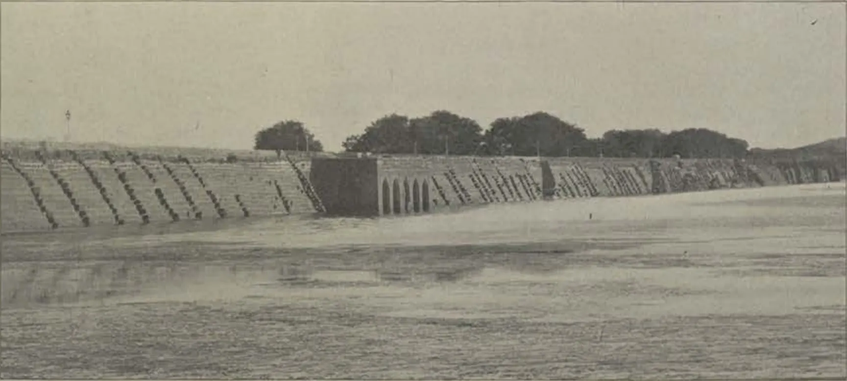 The Hussain Sagar bund, a long stone embankment.