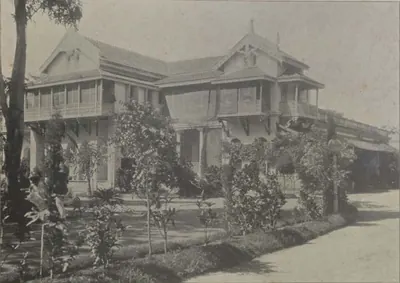 Rahat Manzil, a two-storeyed house with timber verandahs and gables.