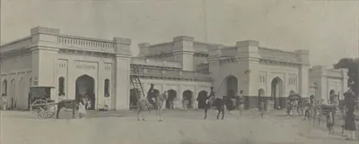 The Hyderabad railway station building, with carriages in front.