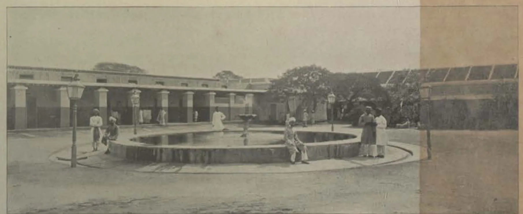 The Afzal Gunj hospital, a low building around a court with a round pool.