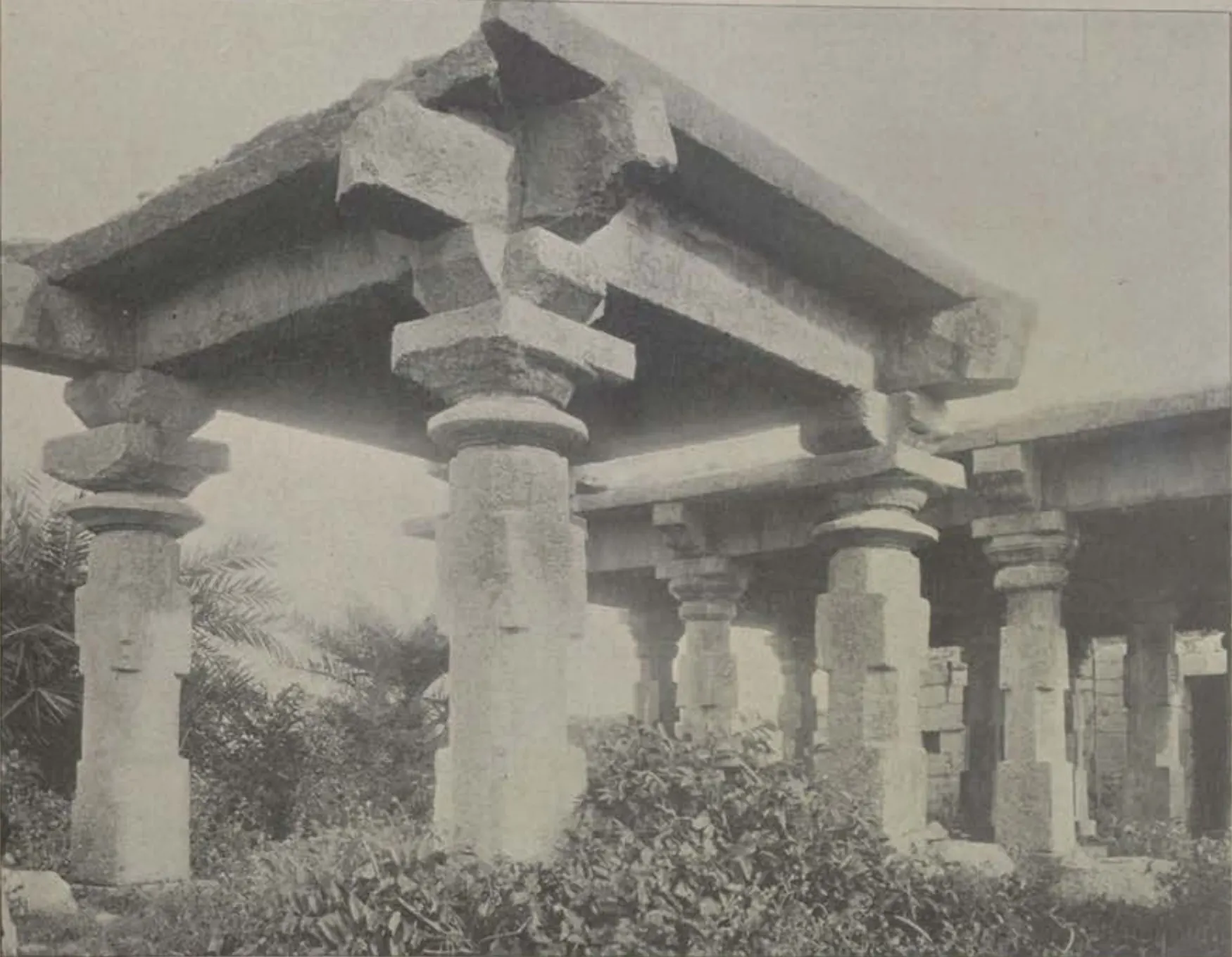 A stone pavilion with heavy pillars and beams at Amberpet.