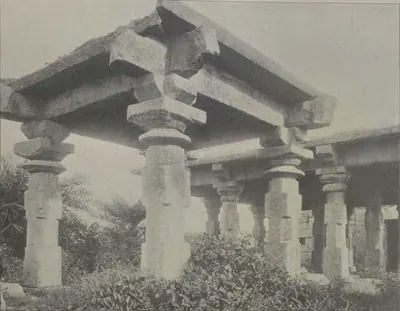 A stone pavilion with heavy pillars and beams at Amberpet.