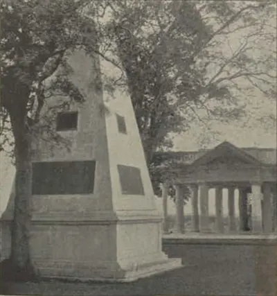 Raymond's tomb, an obelisk with inscribed tablets, beside a small colonnaded pavilion.