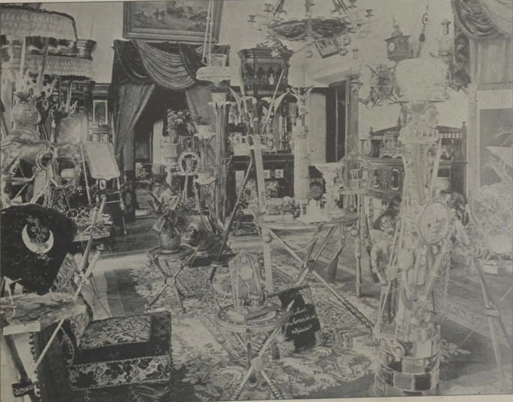 A room of the Sarurnagar palace crowded with furnishings and hangings.
