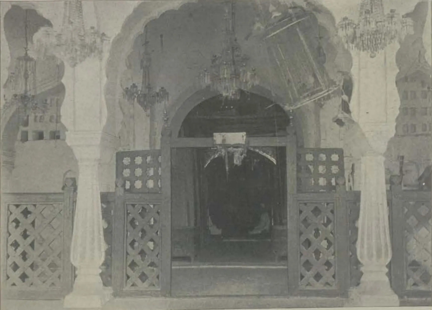 The shrine at Moula Ali, a decorated arched doorway with lattice screens and hanging lamps.