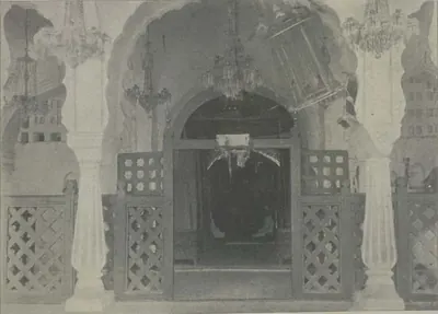 The shrine at Moula Ali, a decorated arched doorway with lattice screens and hanging lamps.