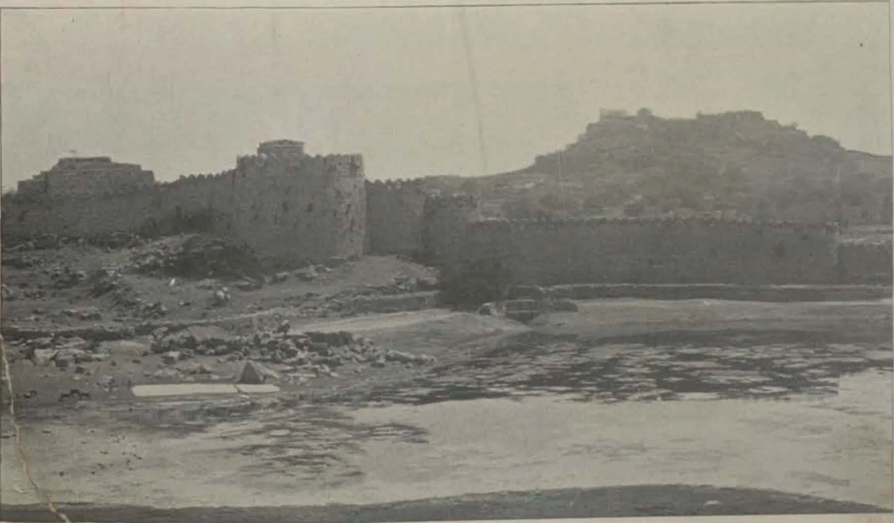 The walls of Golconda fort with the citadel hill behind.