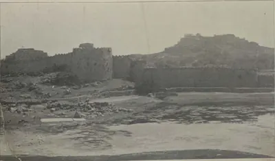 The walls of Golconda fort with the citadel hill behind.
