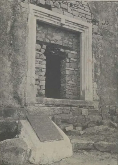 A doorway of the Ambar Khana, with an inscribed tablet set below it.