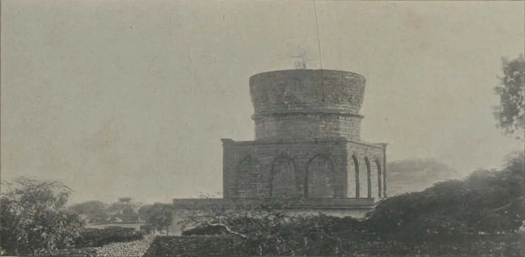 The unfinished tomb of Abul Hasan, a round drum on a square base, without a dome.