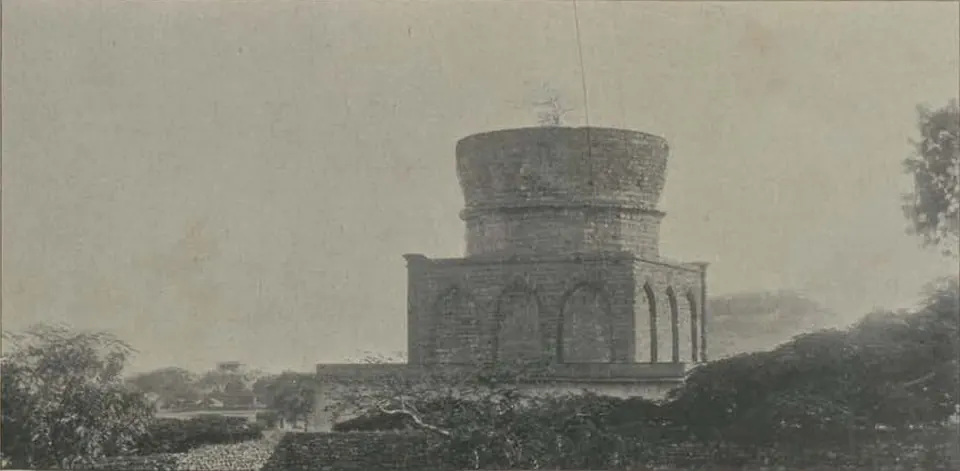 The unfinished tomb of Abul Hasan, a round drum on a square base, without a dome.