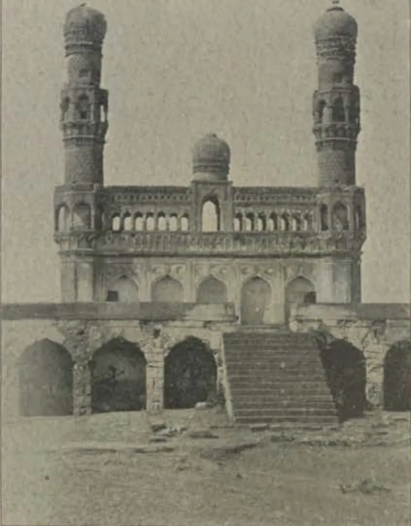 The Idgah at Elgandal, an arcaded building with two tall minarets and steps in front.