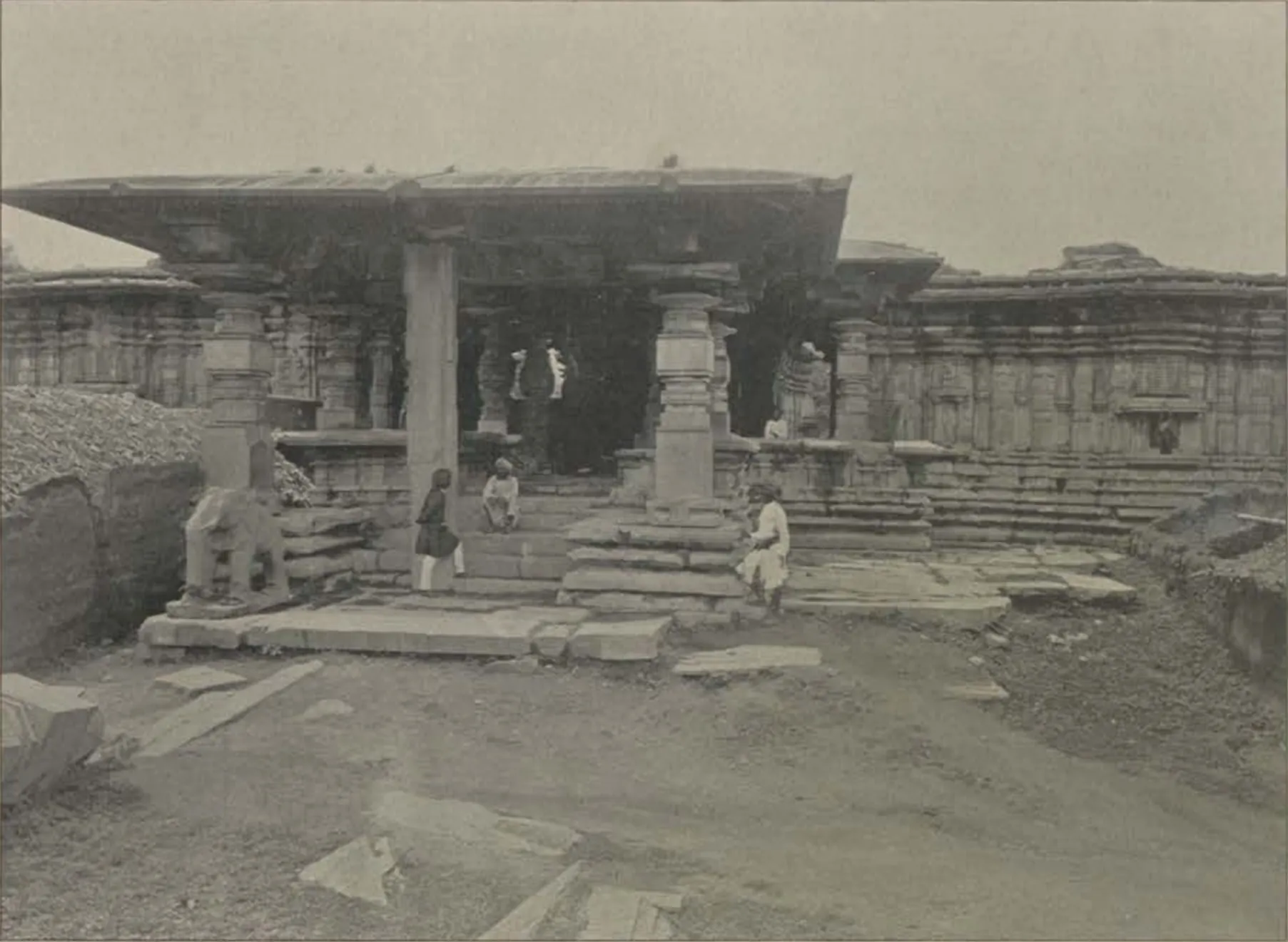The Thousand Pillar Temple at Hanamkonda, a pillared hall of dark stone with people on its steps.