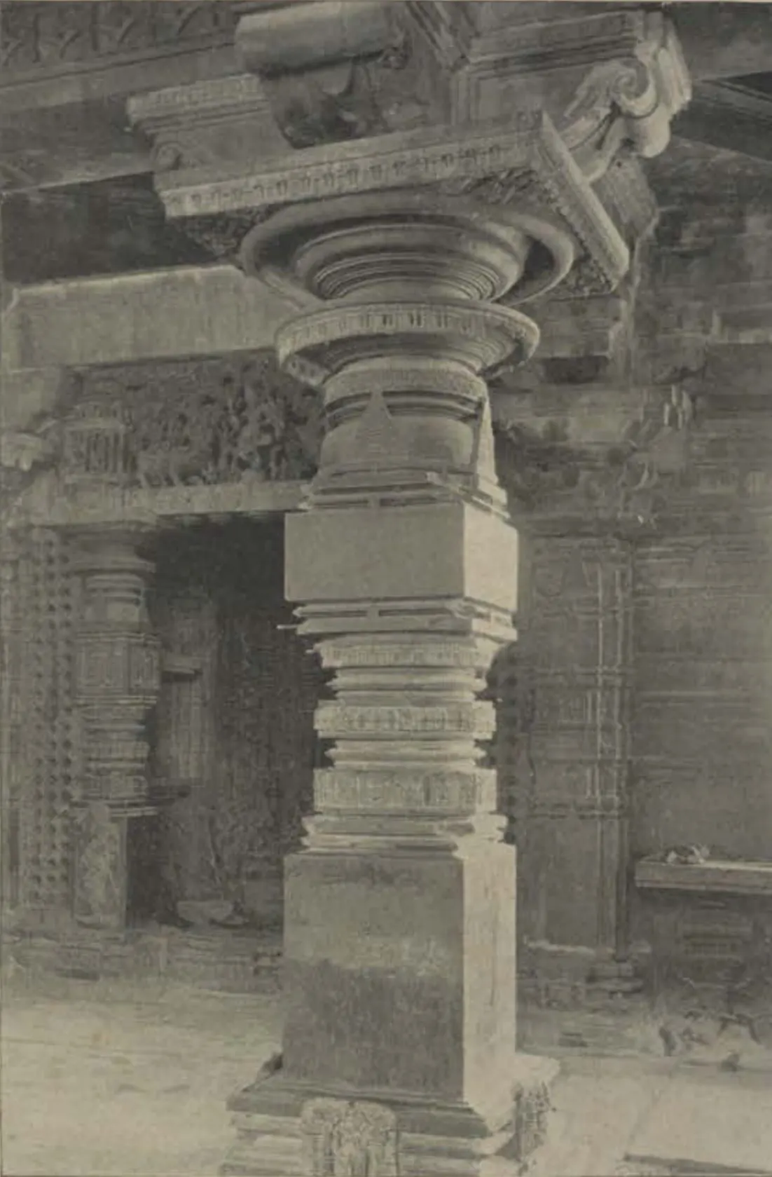 A carved pillar with an inscription at the Thousand Pillar Temple.