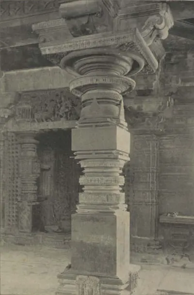A carved pillar with an inscription at the Thousand Pillar Temple.