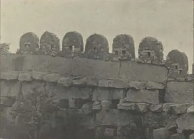 A fort wall with rounded merlons.