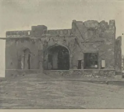 Ruined walls of a palace on the summit of the rock.
