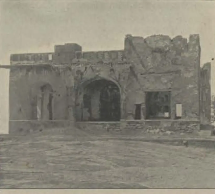 Ruined walls of a palace on the summit of the rock.