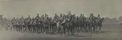 Artillery marching past at the Diamond Jubilee review in Hyderabad, with guns drawn in line.