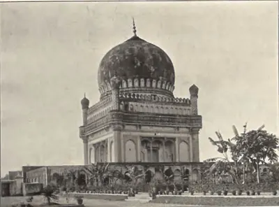 The tomb of Muhammad Quli Qutb Shah, a large dome on a two-storeyed arcaded tomb, with a garden in front.