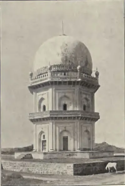 The tomb of Jamshid Quli Qutb Shah, an octagonal two-storeyed tomb with a dome, on a platform.