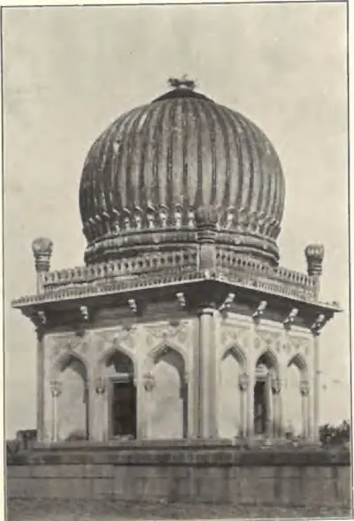 A small square tomb with a ribbed dome and corner turrets, near the tomb of Sultan Quli Qutb Shah.