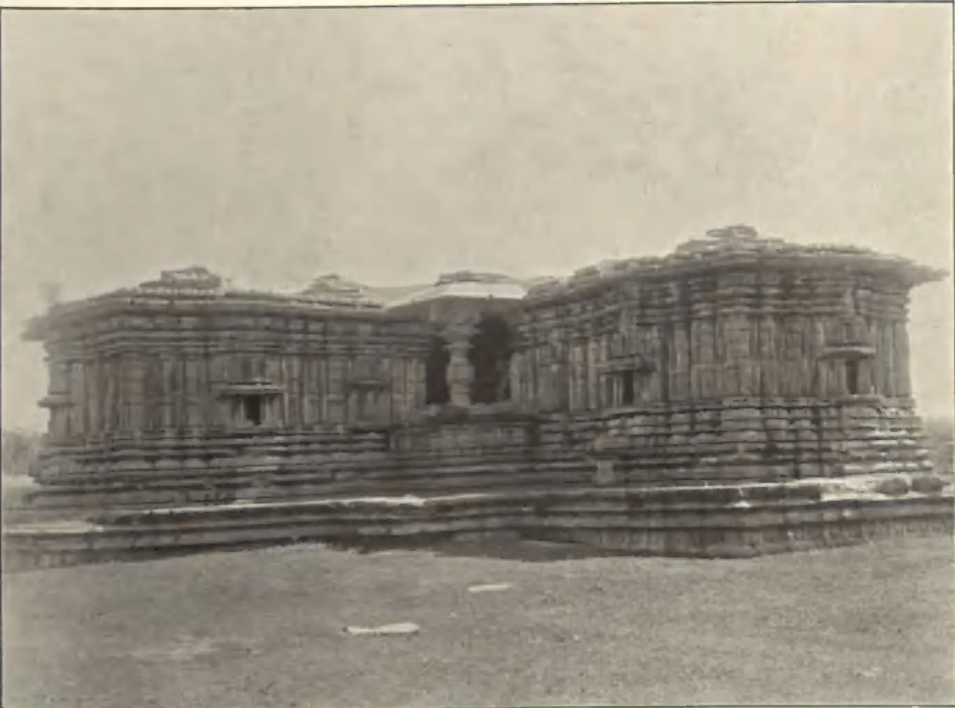 The Thousand Pillar Temple, a low, wide temple on a stepped plinth, seen across open ground.