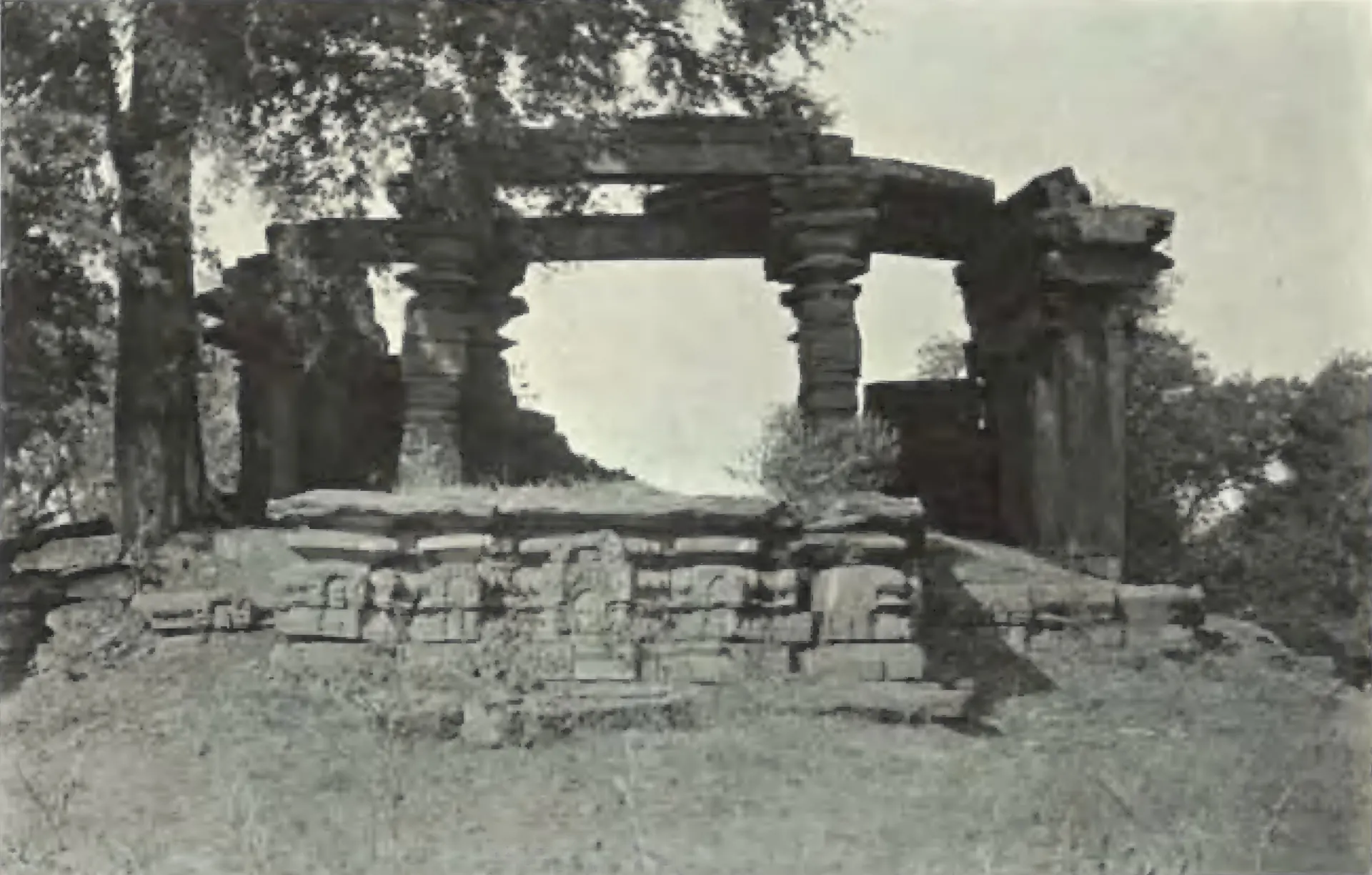 The ruined porch of the Gautamesvara temple at Manthani, pillars and beams on a carved plinth.