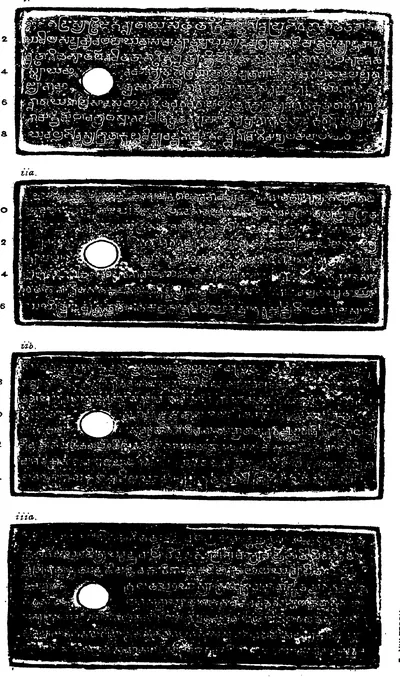 Ink impressions of four inscribed copper plates, the letters of the Telugu-Kannada script showing pale on a dark ground, each plate with a round ring hole near the left edge.