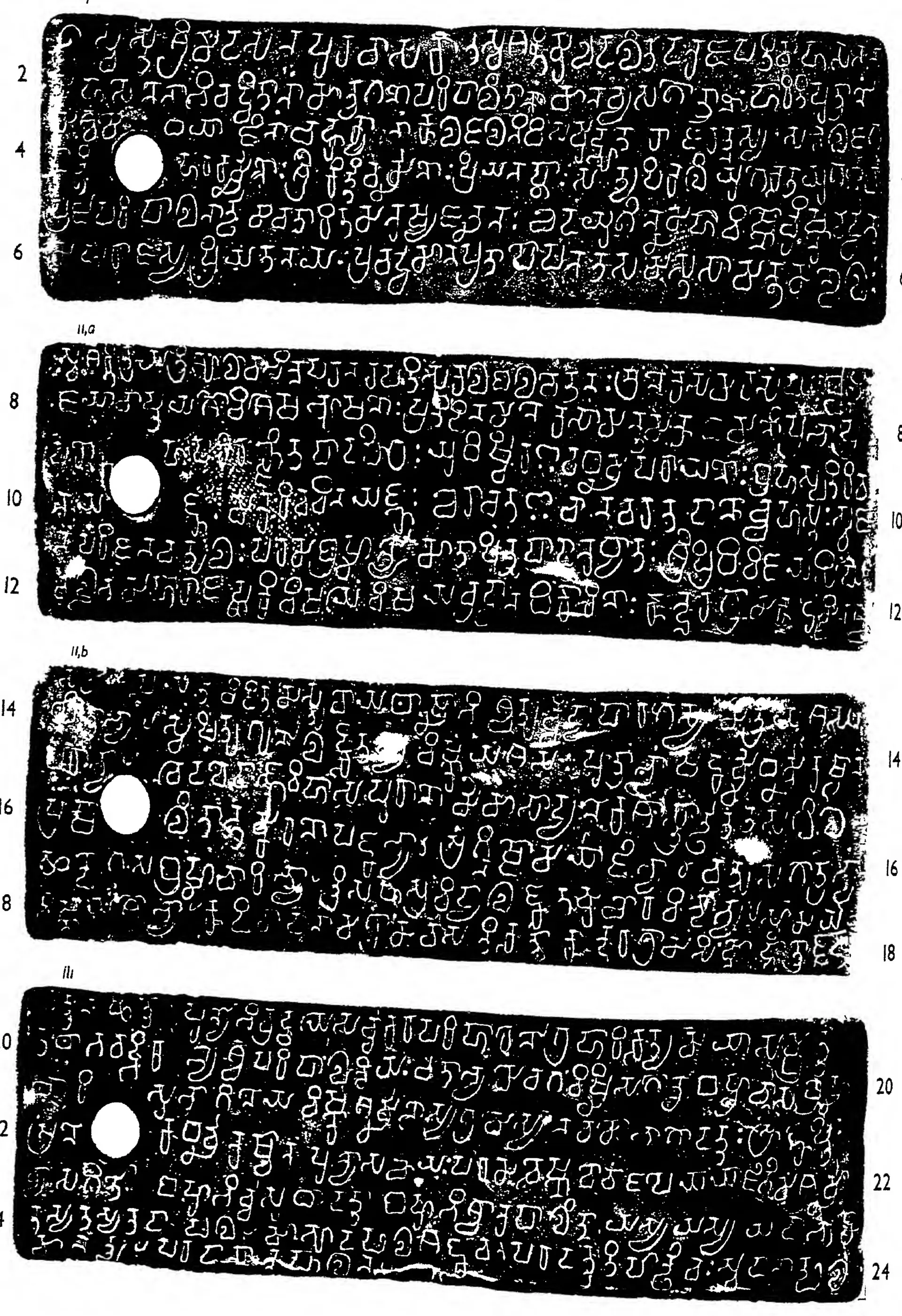 Ink impressions of four inscribed copper plates, the letters of the Telugu-Kannada script showing pale on a dark ground, each plate with a round ring hole near the left edge.