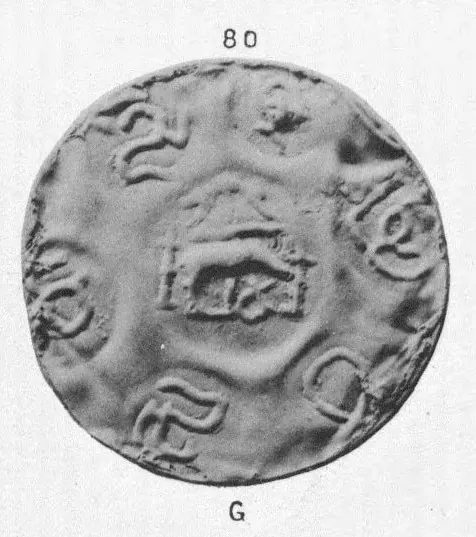Photograph of a large, thin gold coin with a central punch-mark of a boar-like animal under a canopy, surrounded by punch-marks of letters; the plate number 80 above and G below.