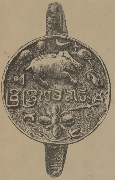 Engraving of a round seal on a heavy ring: a boar running to the right among a crescent, lamps, a fly-whisk and other emblems, a line of large letters across the middle and a lotus flower below.