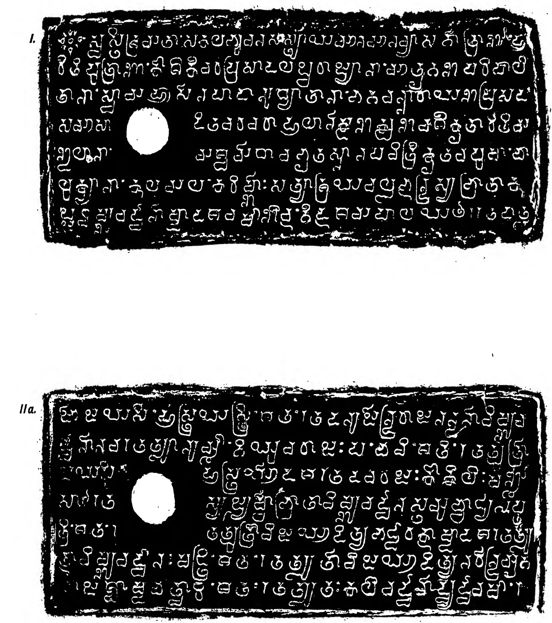 Ink impressions of two inscribed copper plates, the letters of the Telugu-Kannada script showing pale on a black ground, each plate with a round ring hole near the left edge.