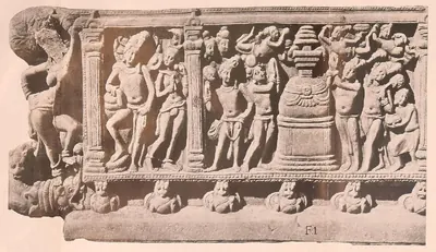 Carved frieze panel with a stupa and worshippers between pilasters, above a row of small heads.