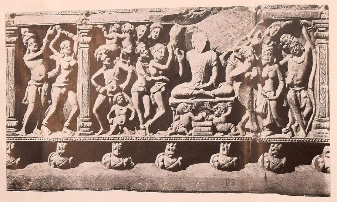 Carved frieze panel with a seated Buddha among standing figures.
