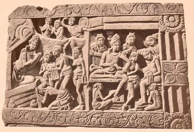 Carved relief in two scenes: a seated sage receiving a child on the right and a procession to a shrine on the left.