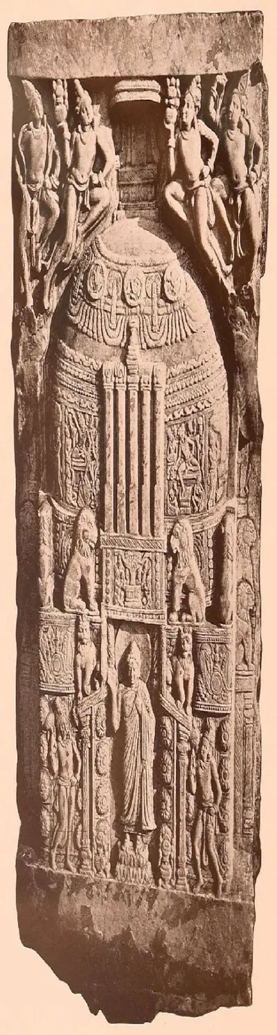 Tall carved slab showing a domed stupa decorated in bands, with attendant figures.